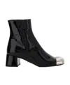 Prada Triangle Logo Plaque Boots In Black