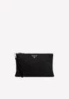 Prada Triangle Logo Plaque Pouch Bag In Black