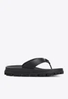 Prada Triangle Logo Rubber Thong Sandals In Black