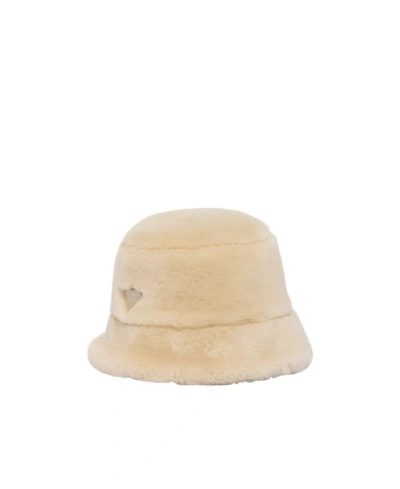 Prada Triangle-logo Shearling Bucket Hat In Beige