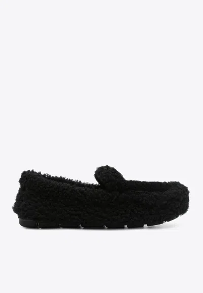 Prada Triangle Logo Shearling Loafers In Black