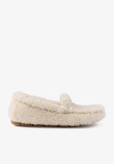 PRADA TRIANGLE LOGO SHEARLING LOAFERS