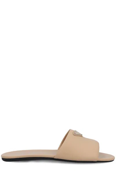 Prada Triangle Logo Leather Flat Sandals In Beige