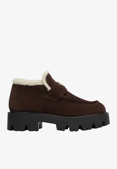 Prada Triangle Logo Suede Loafers In Brown