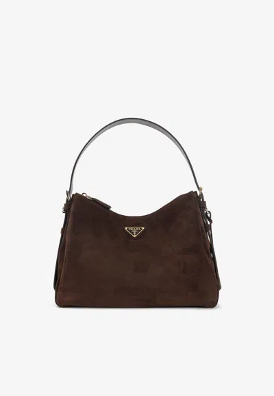 Prada Triangle Logo Suede Shoulder Bag In Pink