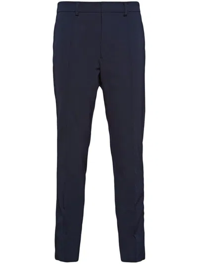 Prada Rear Logo-patch Tailored Trousers In Blue