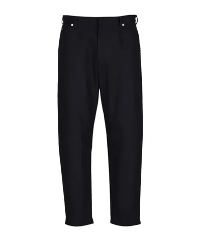 Prada Triangle-logo Tapered-leg Jeans In Black