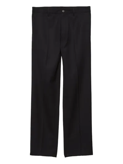 Prada Triangle-logo Wool Trousers In Black