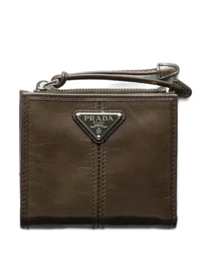 Prada Triangle Logo Zip Leather Wallet In Brown