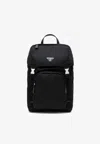 Prada Triangle Logo Zipped Backpack In Black