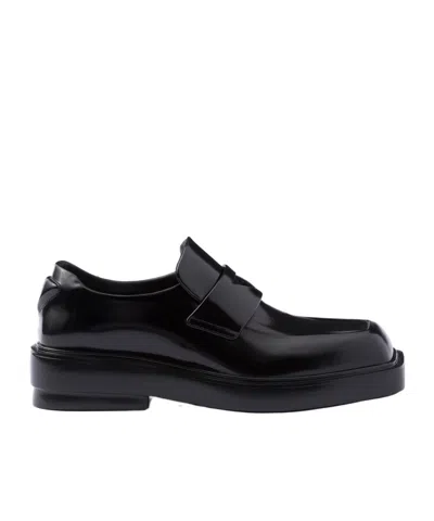 PRADA PRADA TRIANGLE-PATCH SLIP-ON LOAFERS