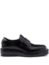 Prada Triangle Patch Leather Loafers In Black