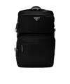 Prada Triangular Logo Backpack In Blue