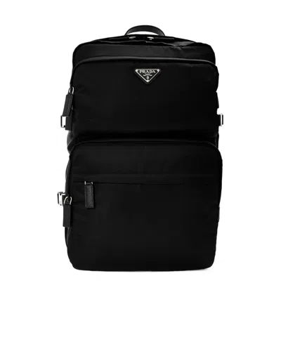 Prada Triangular Logo Backpack In Blue