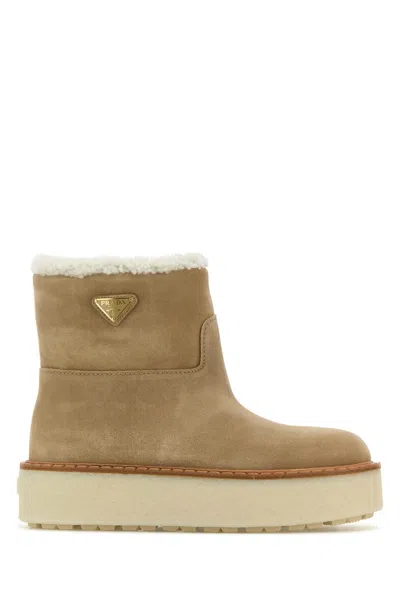 Prada Logo Shearling Boots In Beige