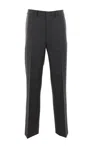 Prada Prince Of Wales Checked Wool Trousers In Gray