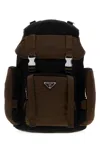 Prada Renylon Backpack Featuring Practical Side Pockets In Brown