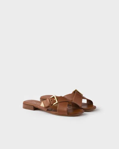 PRADA LEATHER CRISSCROSS SLIDES WITH BUCKLE