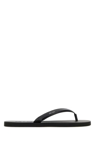 Prada Logo Embossed Leather Flip Flop Sandals In Black