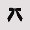 Prada Triangle Logo Velvet Bow Hair Clip In Nero