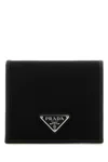 Prada Black Wallet With Classic Fold-over Design And Logo Plaque In Black