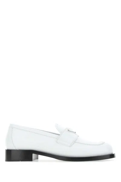 Prada Triangle Logo Brushed Leather Loafers In White