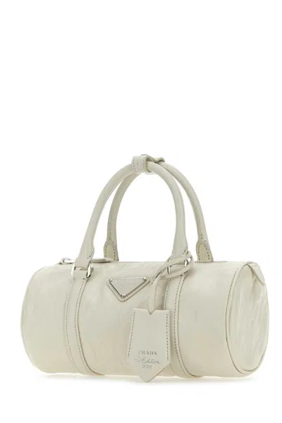 Prada Small Leather Handbag With Detachable Strap And Accessory In Cream
