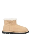 Prada Triangle-logo Suede Boots In Beige