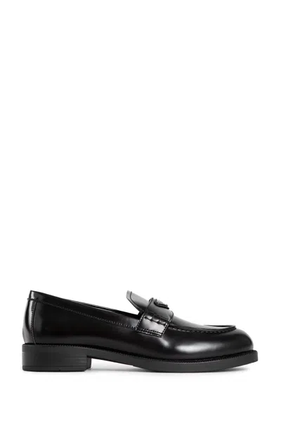 Prada Leather Loafers With Decorative Buckle And Round Toe In Black