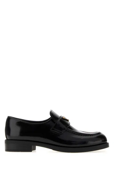 Prada Brushed Leather Loafers In Black