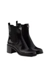Prada Brushed Leather Booties In Black