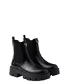 Prada Monolith Brushed Leather Chelsea Boots In Black
