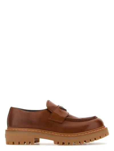 PRADA WOMEN'S CARAMEL LEATHER LOAFERS
