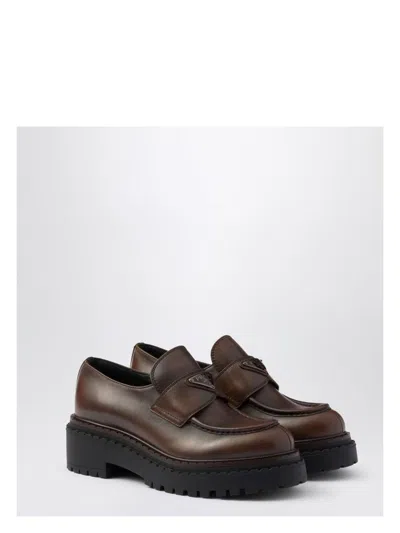 PRADA WOMEN'S CHOCOLATE DARK BRUSHED LEATHER MOCCASIN LOAFER