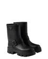Prada Buckle-fastening Lug-sole Boots In Black