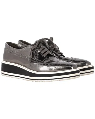 PRADA PRADA WOMEN'S LEATHER METALLIC BROGUE PLATFORM LOW-TOP SNEAKER