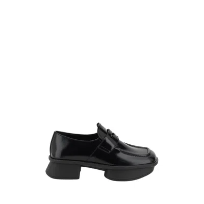 Prada Re-edition Equal Platform Penny Loafer In Nero