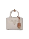Prada Mini Logo Embroidered Canvas Tote Bag In Cream