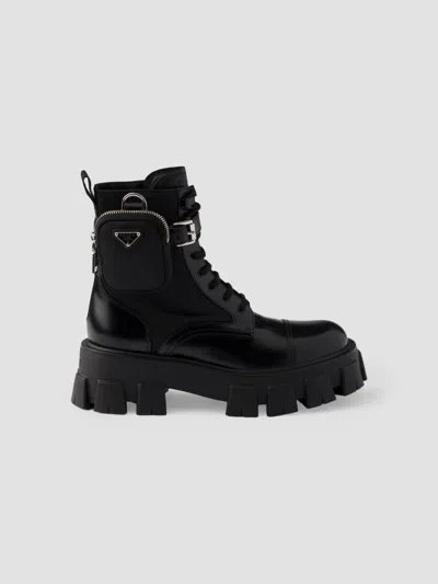 Prada Monolith Leather And Re-nylon Boots With Pouch In Black