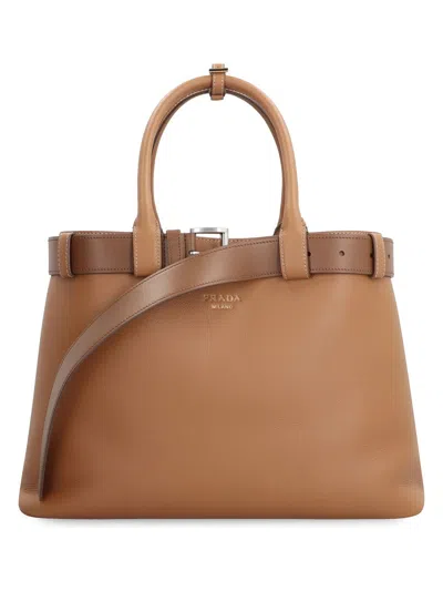 Prada Women's  Buckle Leather Bag In Saddle Brown