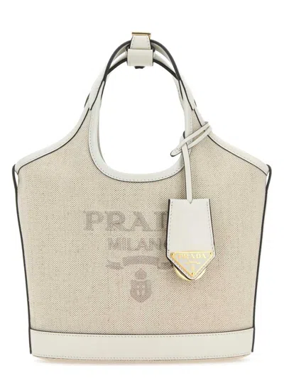 PRADA WOMEN'S SAND CANVAS HANDBAG