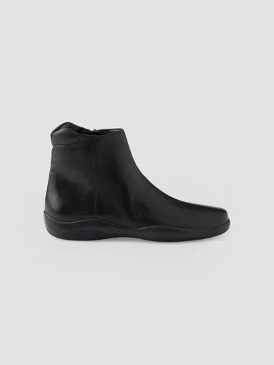 PRADA WOMEN'S TOBLACH NAPPA LEATHER BOOTIES