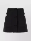 PRADA WOOL MINI SKIRT WITH OVERSIZED POCKETS AND EMBELLISHED ACCENTS