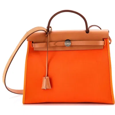 Pre-owned Hermes  Hermes Herbag Zip Leather And Toile 31 In Orange