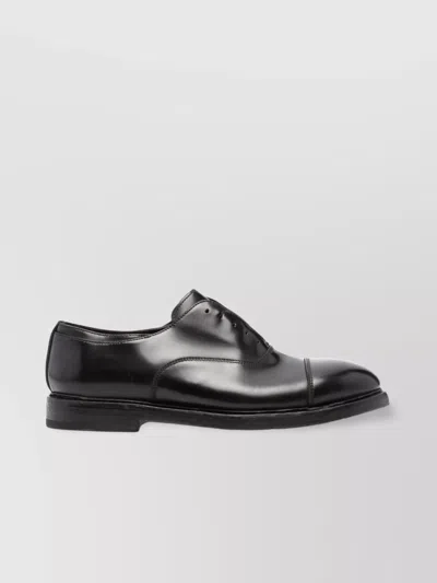 Premiata Glossy Leather Round Toe Derby Shoes In Black