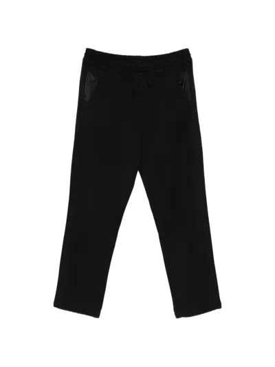 Premiata Logo-patch Drawstring Track Pants In Animal Print