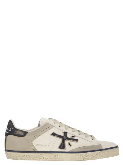Premiata Steven Sneakers In White/blue
