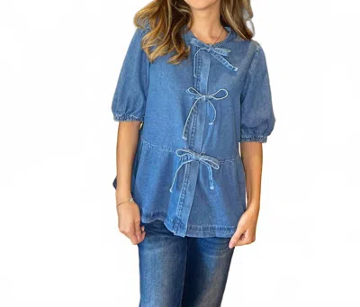 Pretty Bash Peplum Bow Top In Denim In Blue