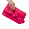 Pretty Simple Billie Bow Convertible Clutch Crossbody Bag In Fuchsia In Pink