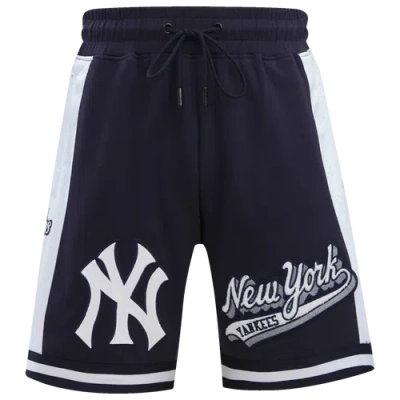 PRO STANDARD MENS NEW YORK YANKEES PRO STANDARD YANKEES SCRIPT TAIL DK 2.0 SHORTS